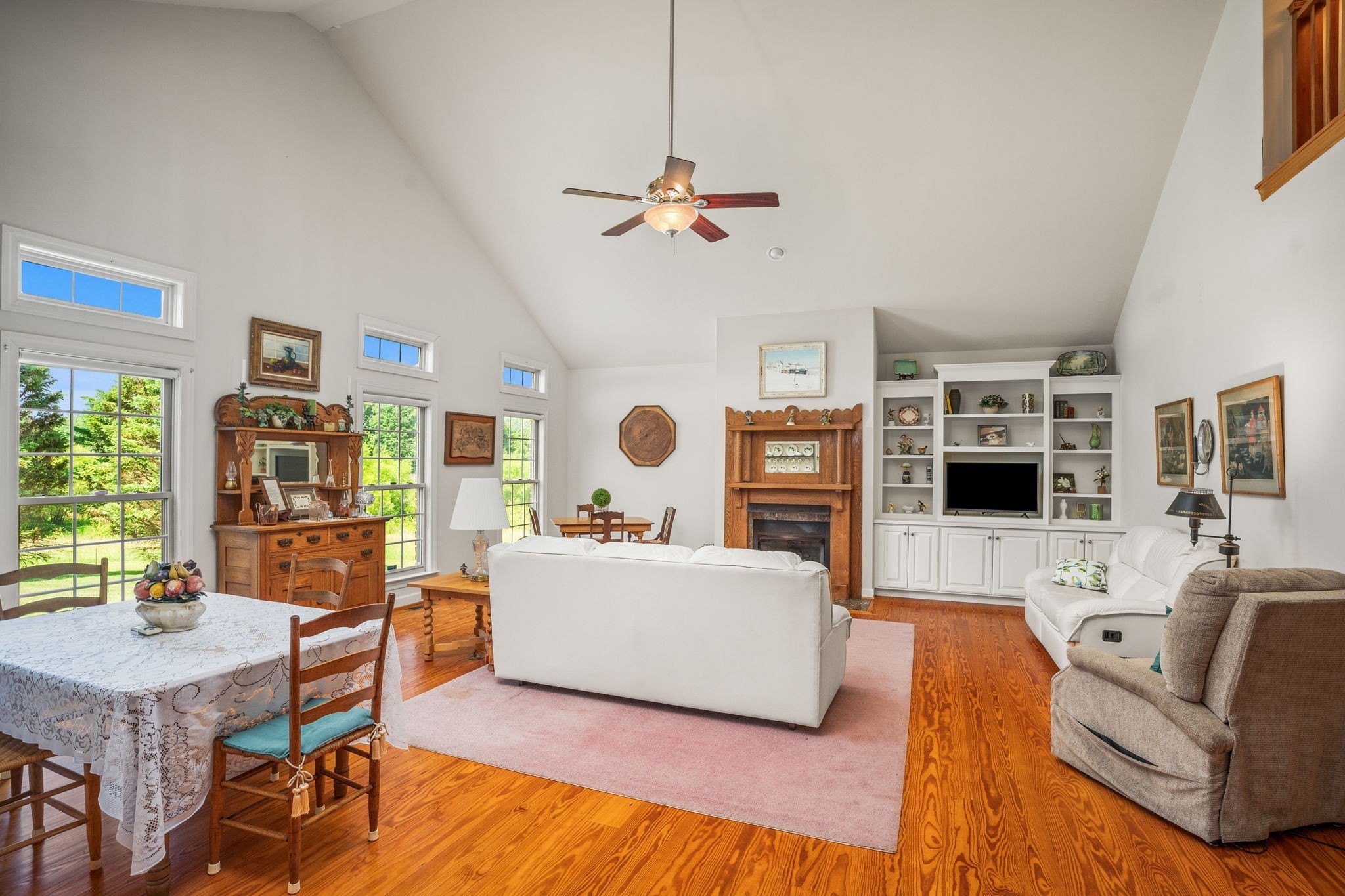 4313 South Garrett Road Springfield, TN 37172 - Photo 17 of 69 a living room with furniture a flat screen tv and a fireplace