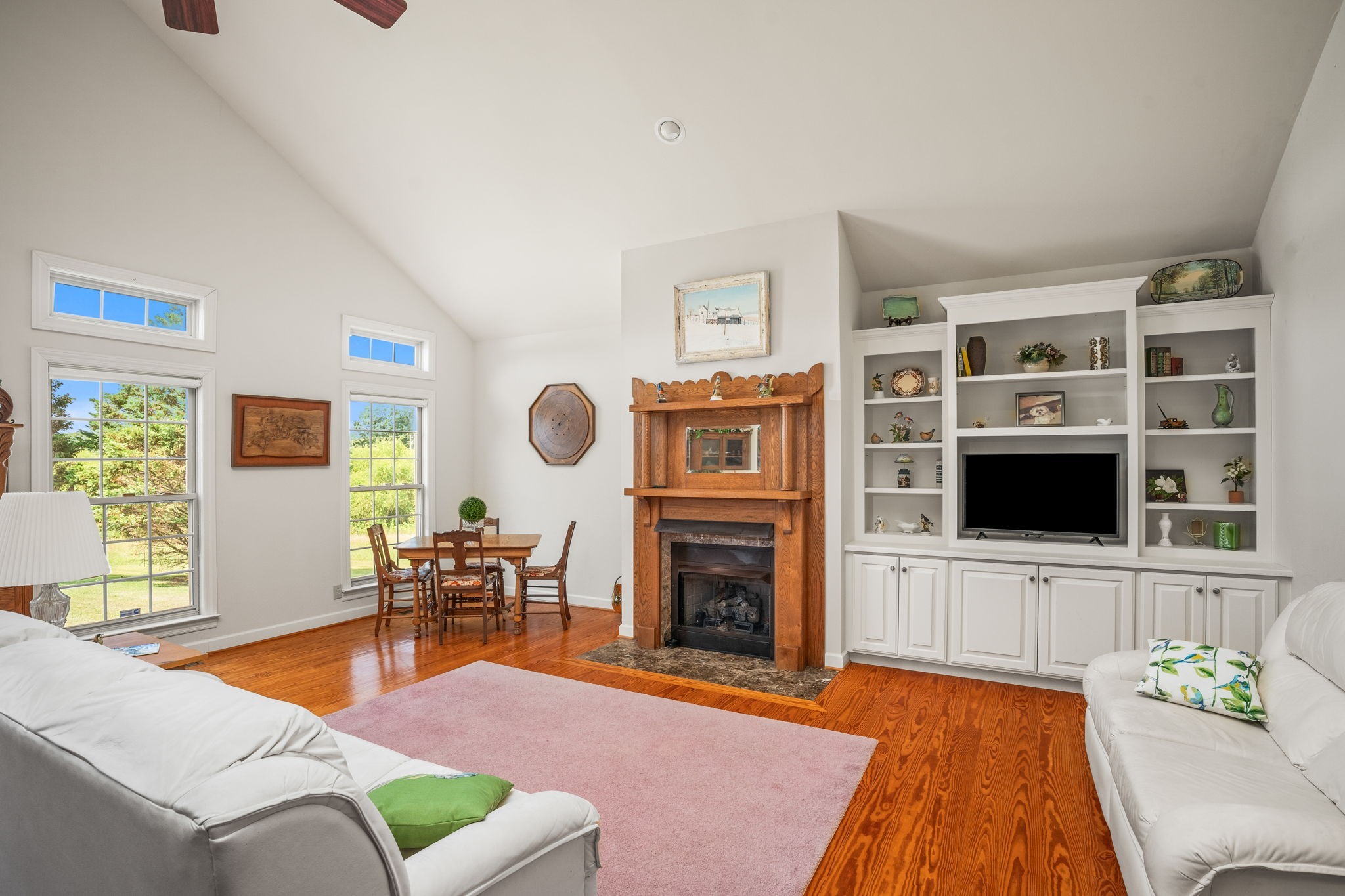 4313 South Garrett Road Springfield, TN 37172 - Photo 18 of 69 a living room with furniture flat screen tv and a fireplace