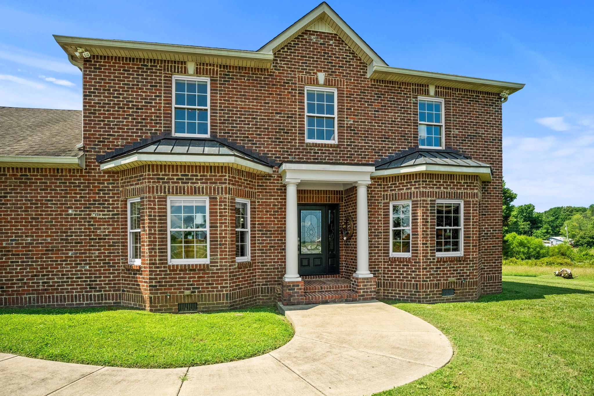 4313 South Garrett Road Springfield, TN 37172 - Photo 3 of 69 front view of a house with a yard