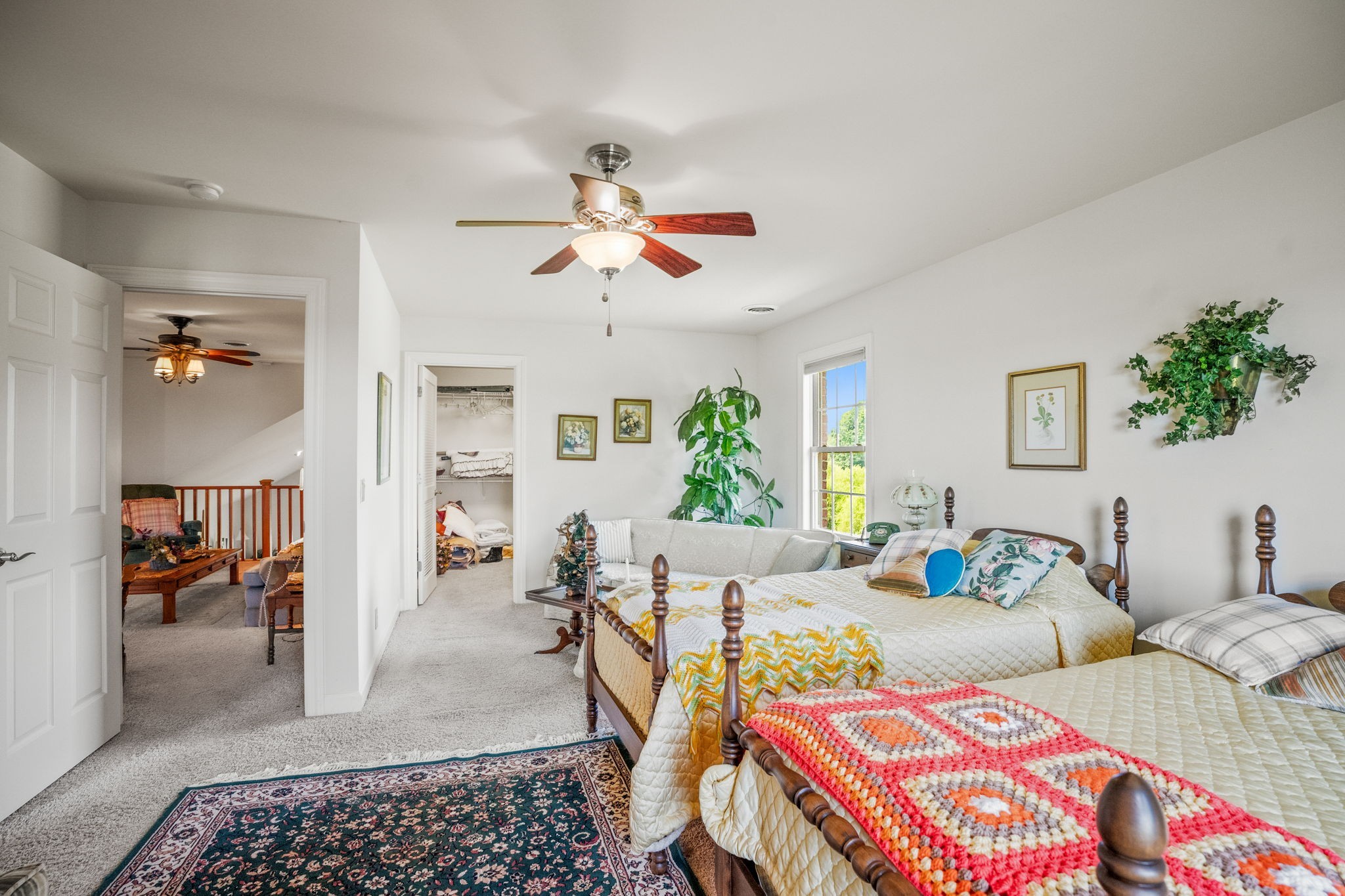 4313 South Garrett Road Springfield, TN 37172 - Photo 32 of 69 a living room with furniture a rug and a chandelier