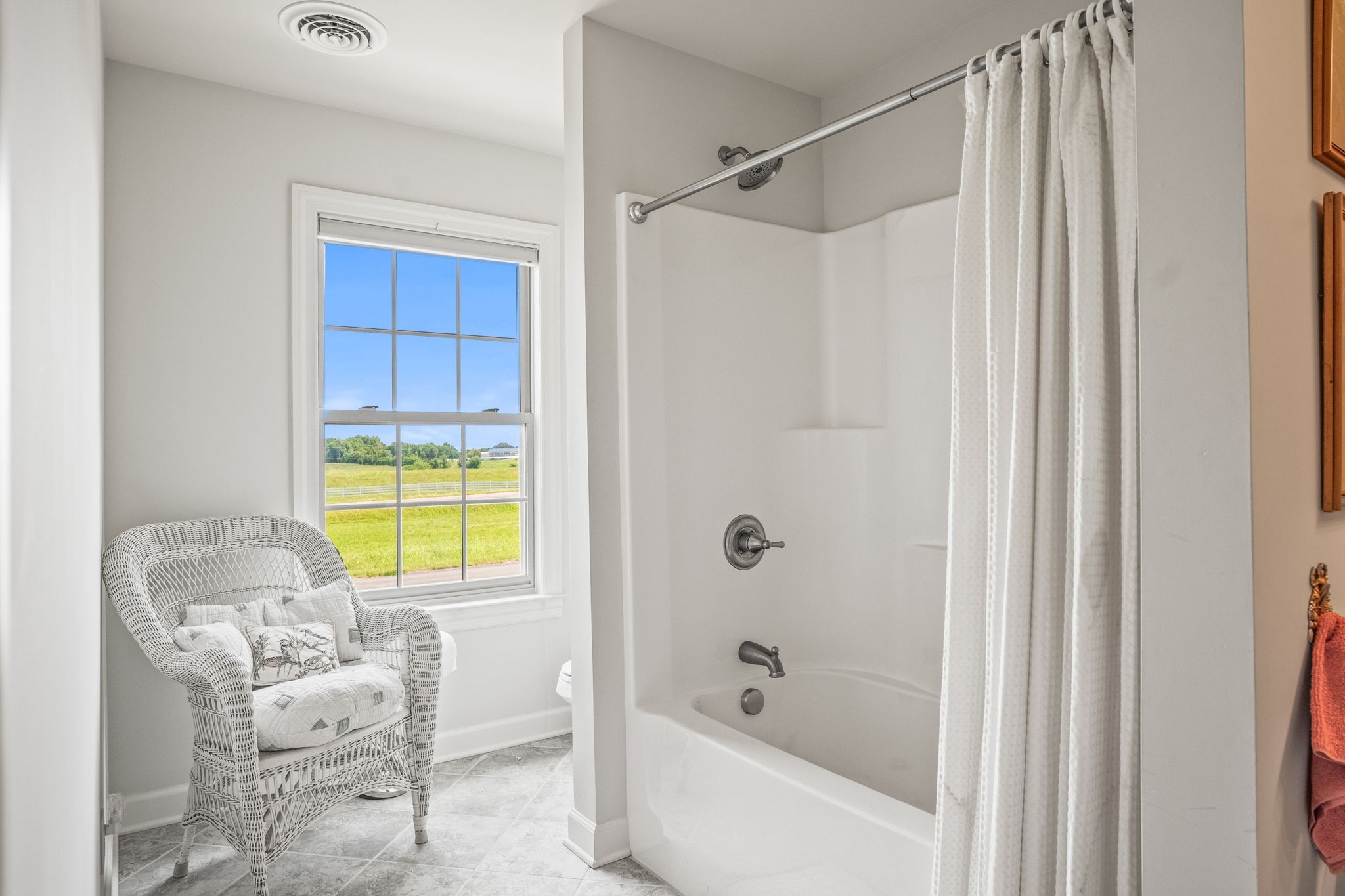 4313 South Garrett Road Springfield, TN 37172 - Photo 34 of 69 a bathroom with a window bathtub and a shower