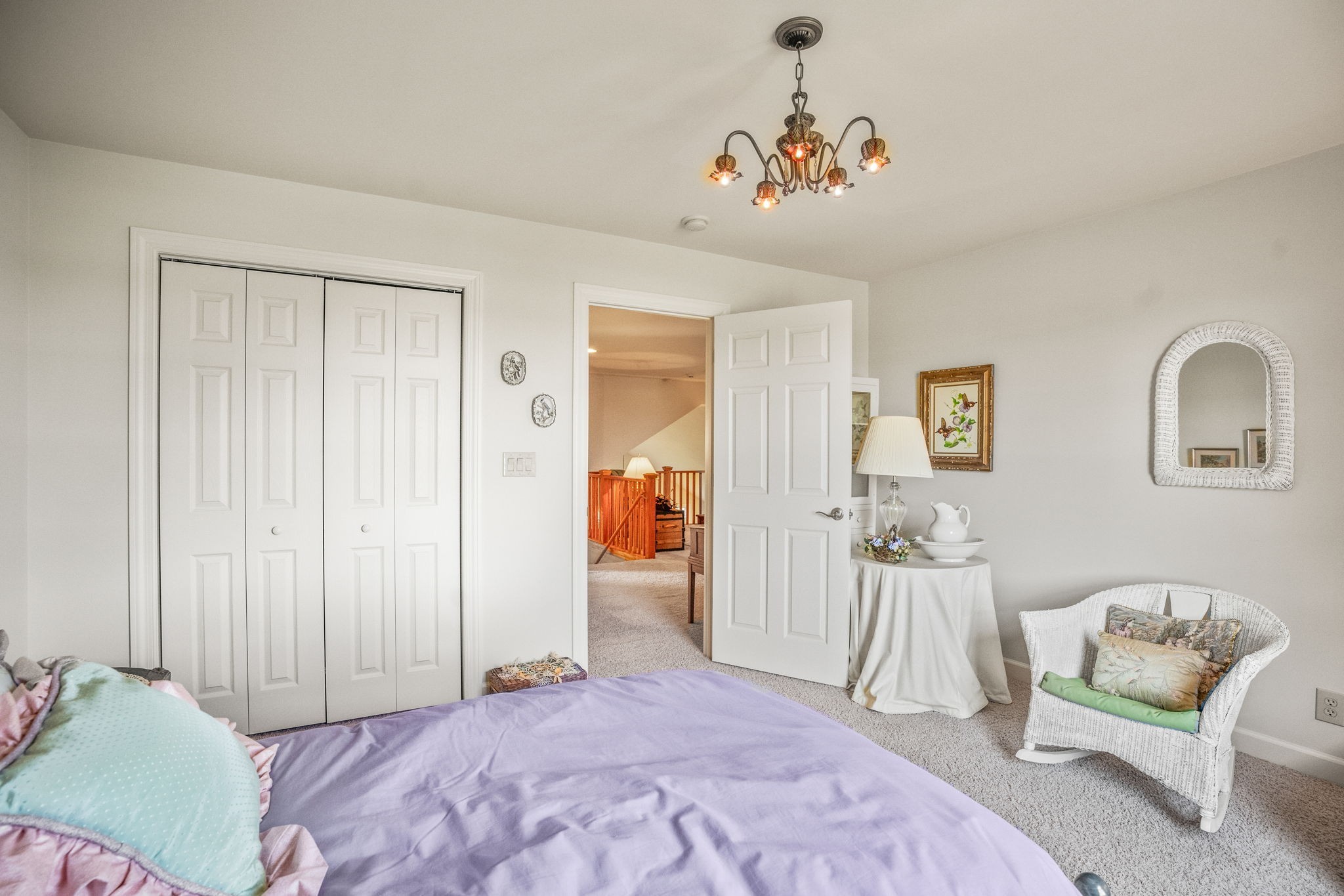 4313 South Garrett Road Springfield, TN 37172 - Photo 36 of 69 a bedroom with a bed and a chandelier