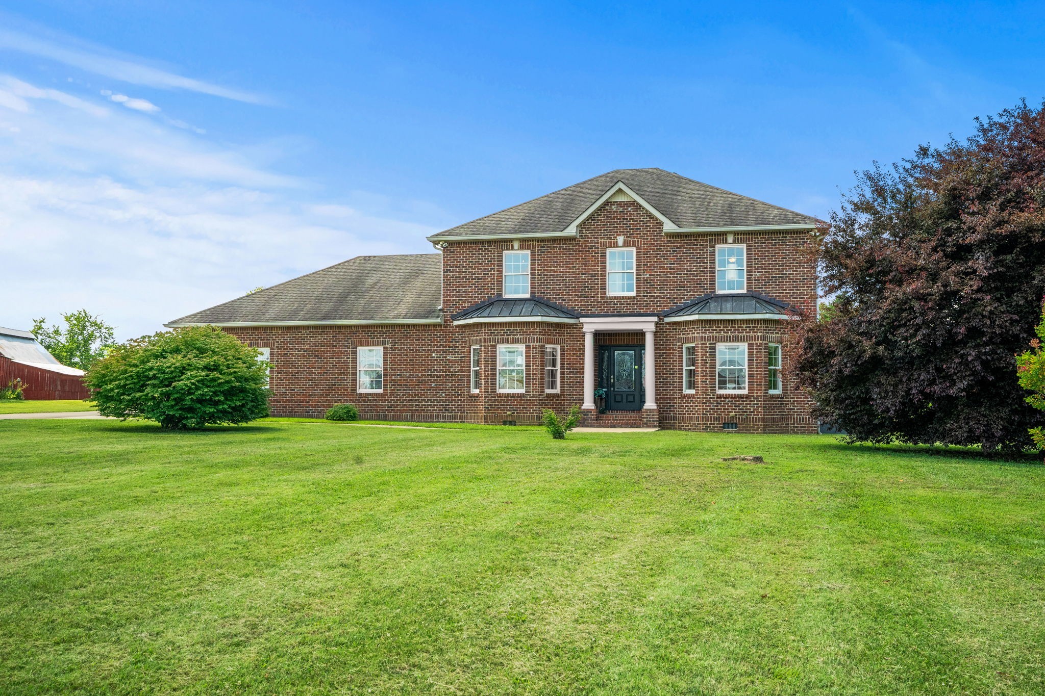 4313 South Garrett Road Springfield, TN 37172 - Photo 65 of 69 a front view of a house with a yard