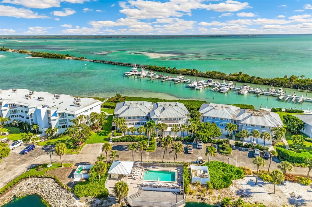 5850 Gasparilla Road, Unit M4 Boca Grande, FL 33921 - Photo 36 of 36 a view of a lake with a city