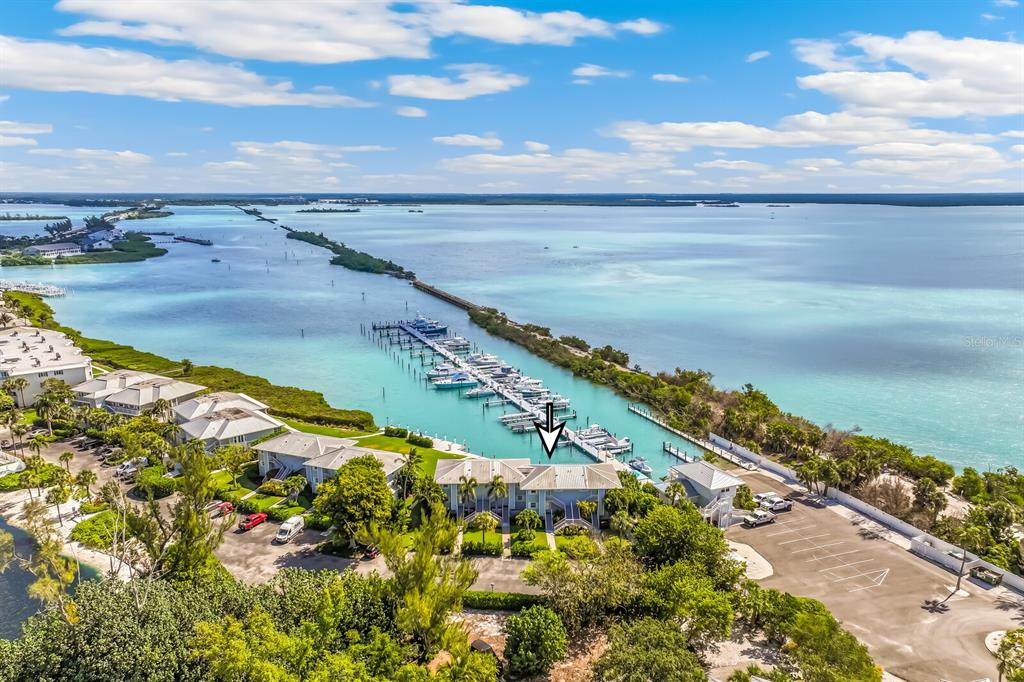 5850 Gasparilla Road, Unit M4 Boca Grande, FL 33921 - Photo 4 of 36 a view of an ocean and beach