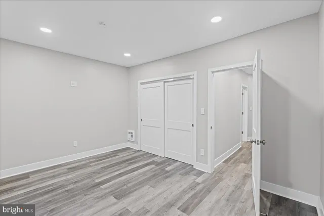 a bathroom with a sink a mirror and a shower