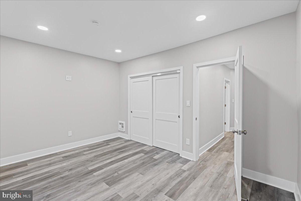 6629 Ross Street Philadelphia, PA 19119 - Photo 14 of 26 wooden floor in an empty room