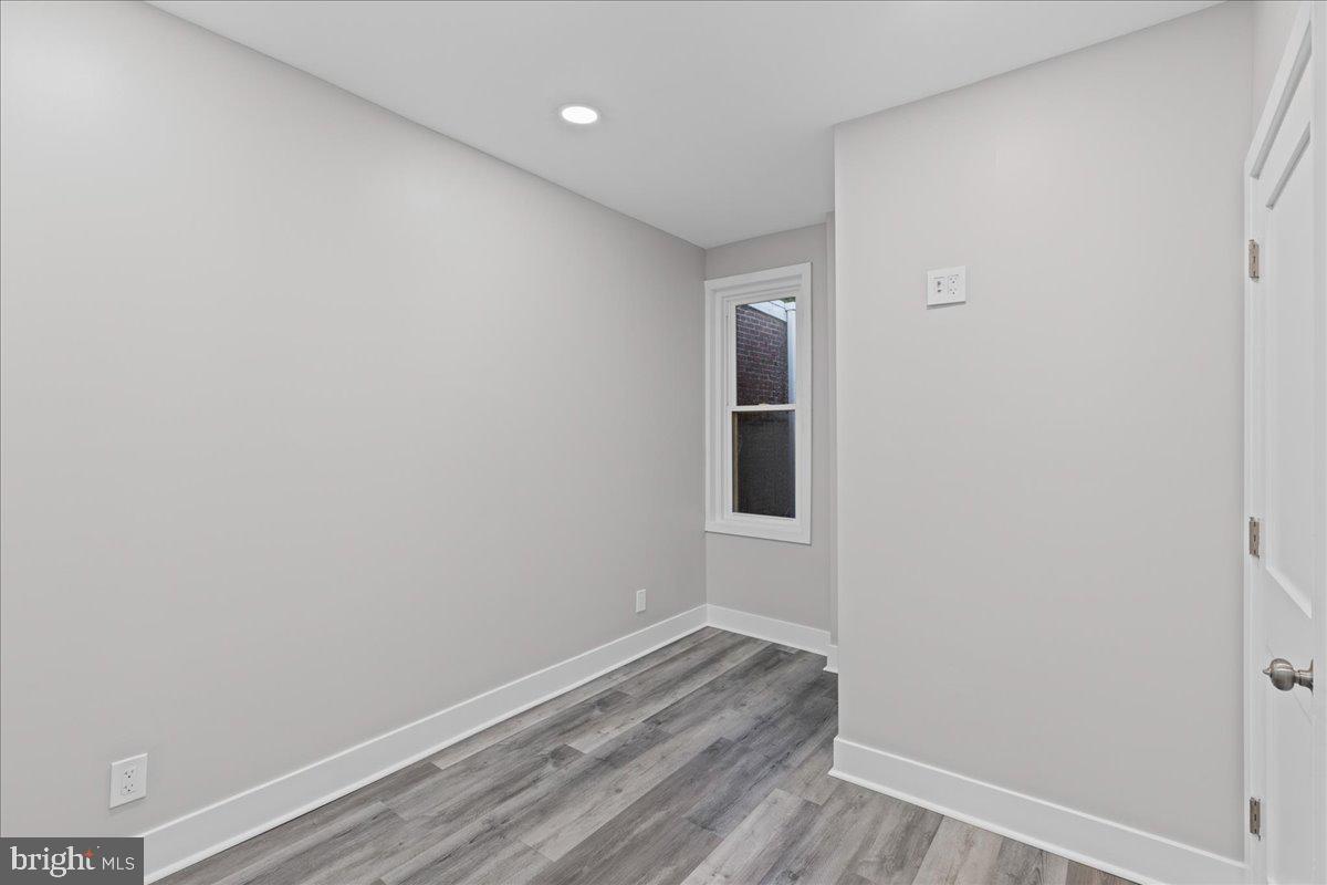 6629 Ross Street Philadelphia, PA 19119 - Photo 16 of 26 a view of a room with wooden floor and white wall
