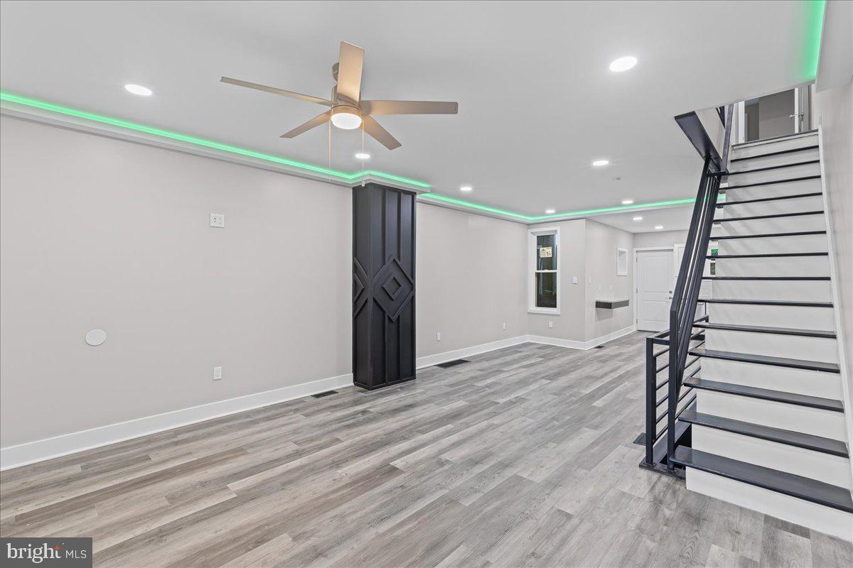 6629 Ross Street Philadelphia, PA 19119 - Photo 4 of 26 wooden floor in an empty room with a window