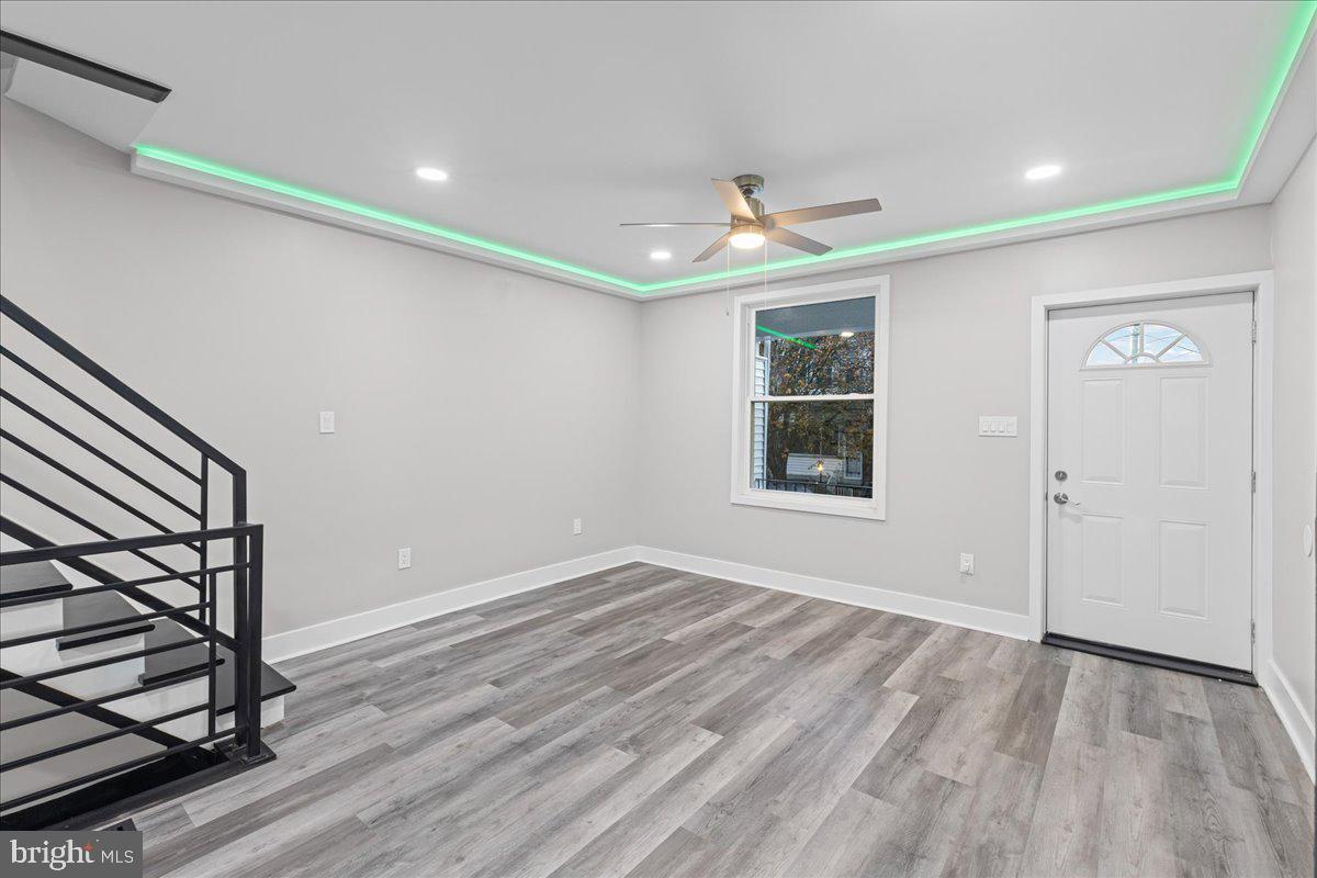 6629 Ross Street Philadelphia, PA 19119 - Photo 6 of 26 wooden floor in an empty room with a window