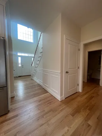 a view of entryway with wooden floor