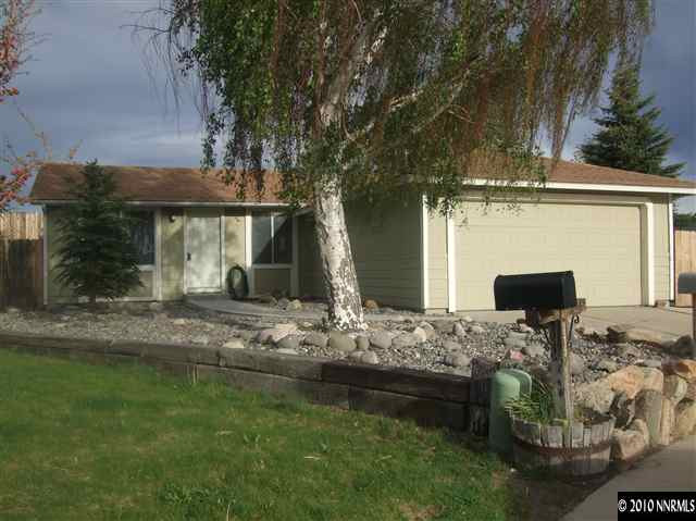 10012 Albite Street Reno, NV 89506 - Photo 1 of 9 a view of house with backyard and patio