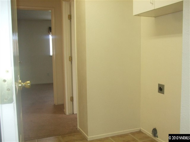 10012 Albite Street Reno, NV 89506 - Photo 6 of 9 a bathroom with a shower