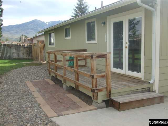 10012 Albite Street Reno, NV 89506 - Photo 9 of 9 a view of a house with a yard
