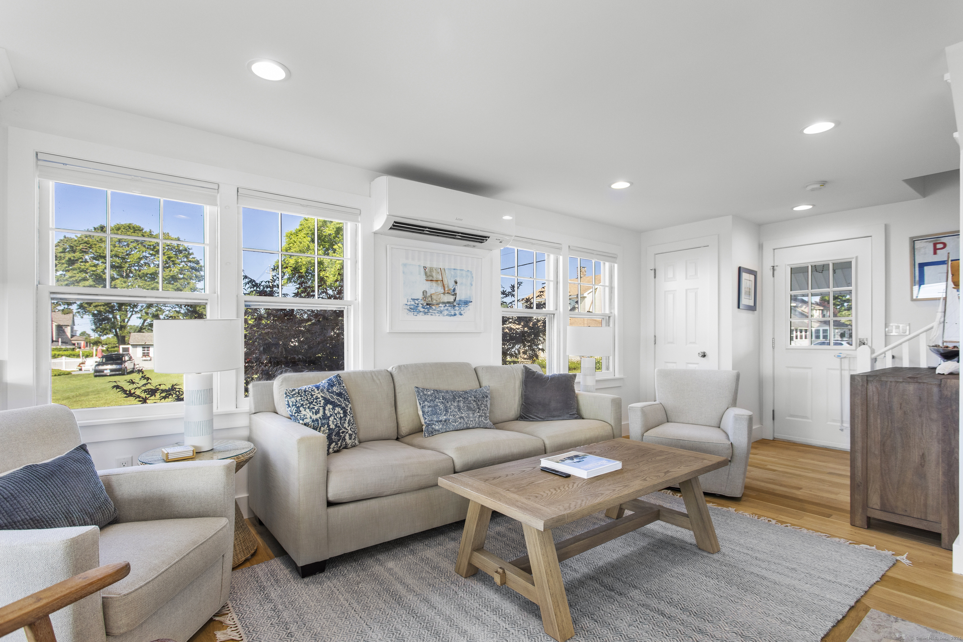 15 Cottage Road Old Lyme, CT 06371 - Photo 3 of 26 a living room with furniture and a wooden floor