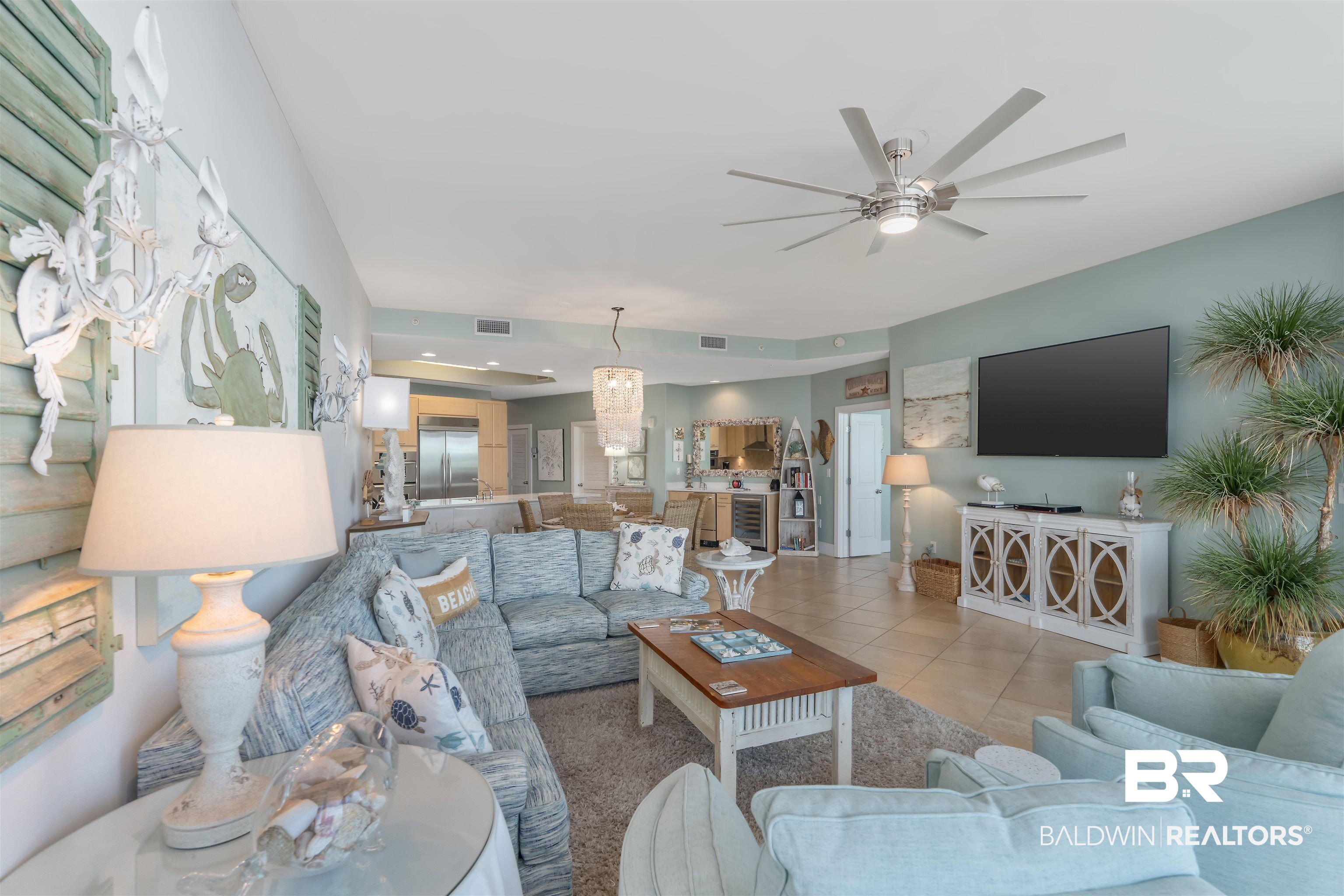 28107 Perdido Beach Boulevard, Unit DPH06 Orange Beach, AL 36561 - Photo 11 of 70 Living room with ceiling fan and light tile patterned floors