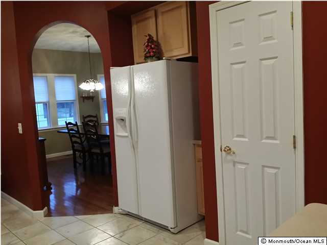 159 Brigantine Road Manahawkin, NJ 08050 - Photo 11 of 23 a view of a hallway with dining area
