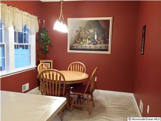159 Brigantine Road Manahawkin, NJ 08050 - Photo 12 of 23 a view of a dining room with furniture