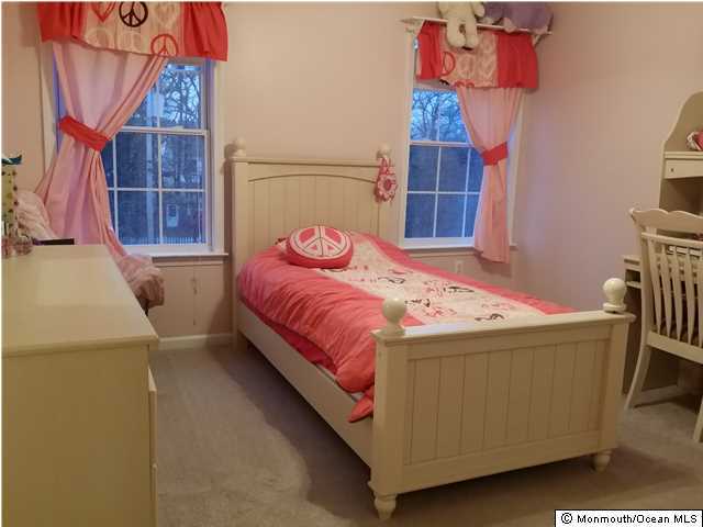 159 Brigantine Road Manahawkin, NJ 08050 - Photo 19 of 23 a bedroom with a bed and a window