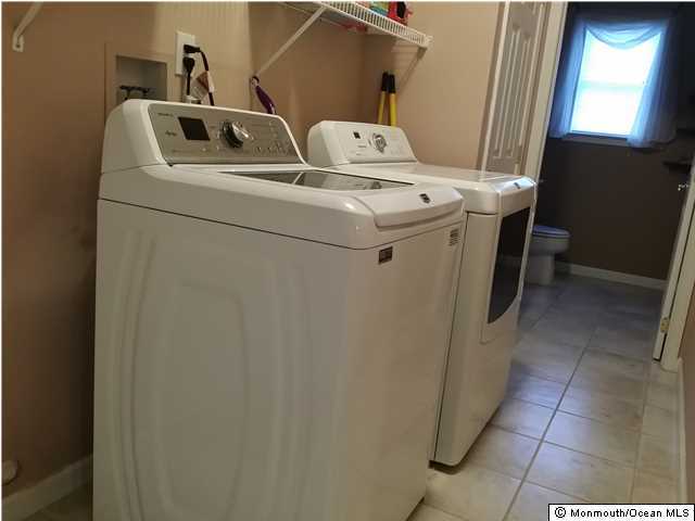 159 Brigantine Road Manahawkin, NJ 08050 - Photo 21 of 23 a utility room with dryer and washer