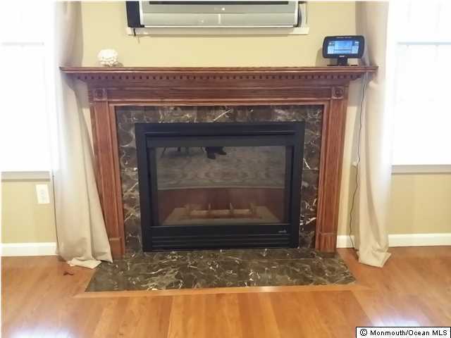 159 Brigantine Road Manahawkin, NJ 08050 - Photo 7 of 23 a view of fireplace and utility room