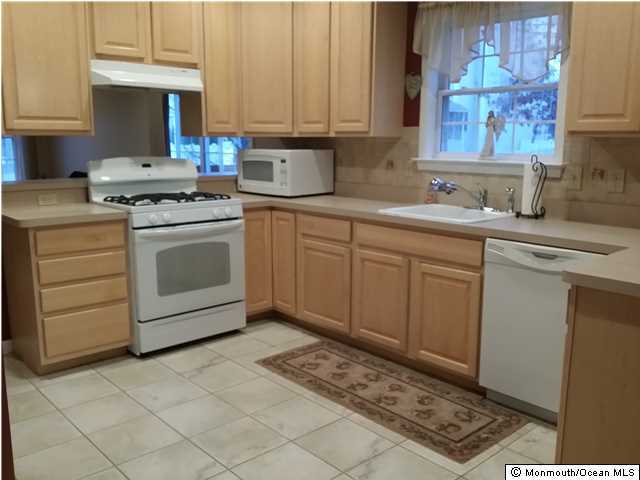 159 Brigantine Road Manahawkin, NJ 08050 - Photo 10 of 23 a kitchen with a sink cabinets and appliances