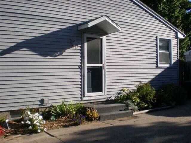2463 Virginia Road Benton Harbor, MI 49022 - Photo 14 of 16 HouseSideDoor