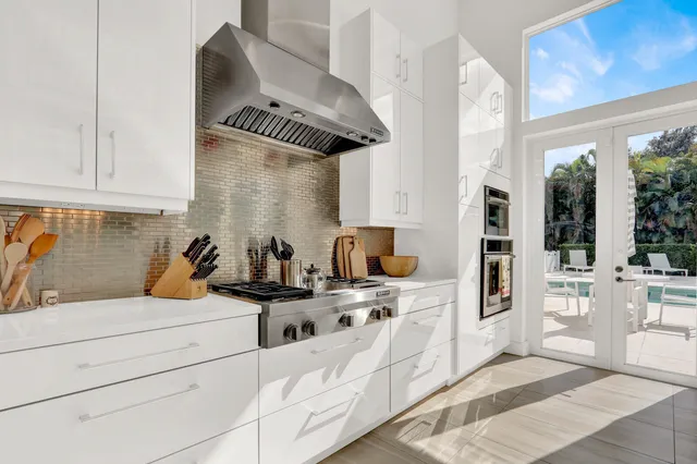 a bedroom with a bed and a flat screen television