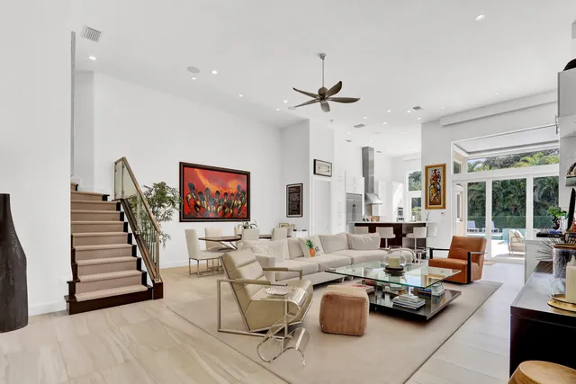 a living room with fireplace furniture and a flat screen tv
