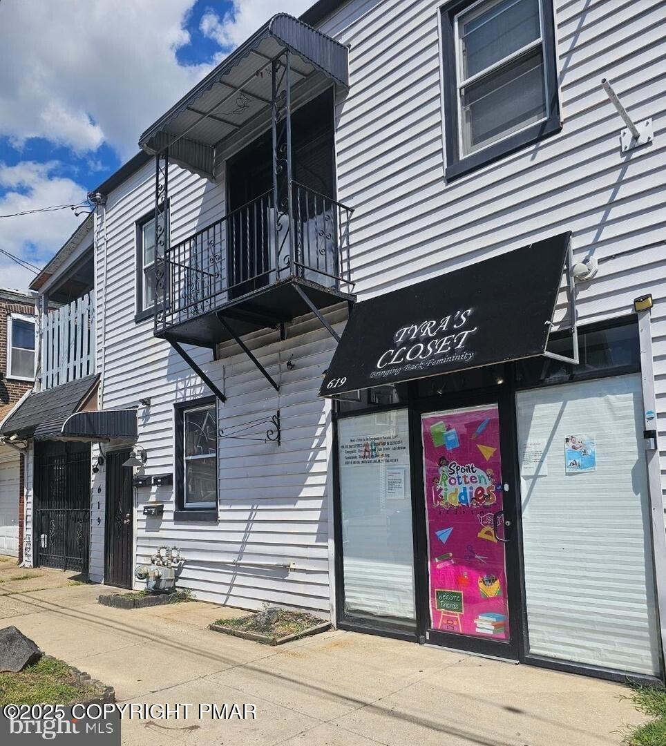 619 Fulton Street Chester, PA 19013 - Photo 7 of 8 a street sign on a street corner