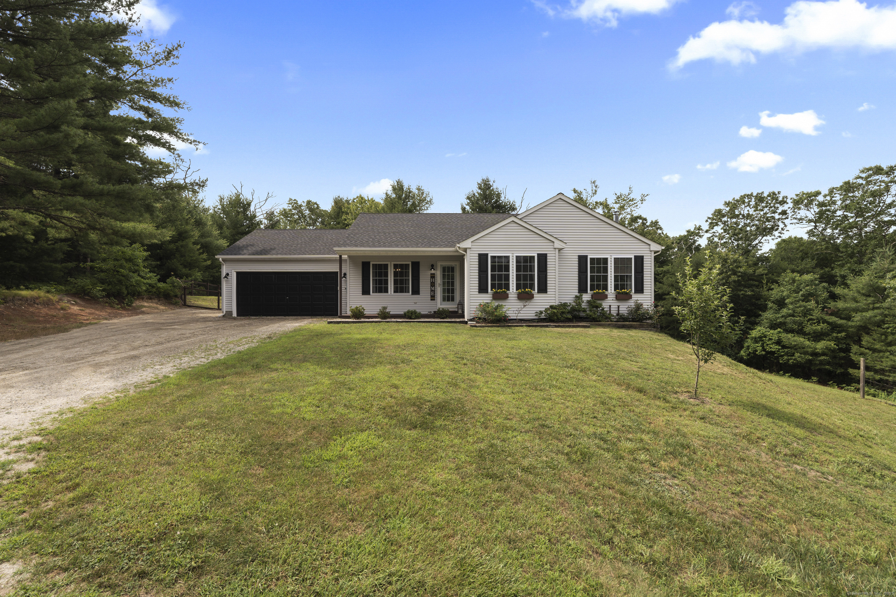 372 Beach Pond Road Voluntown, CT 06384 - Photo 1 of 1 372 Beach Pond Road | Ranch Style Home with Attached Garage located on 4.02 Acres