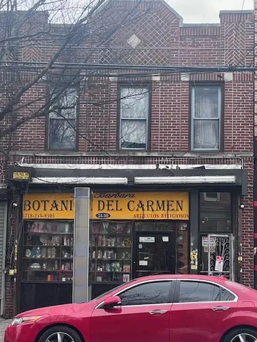 a view of a cafe with a table and chairs