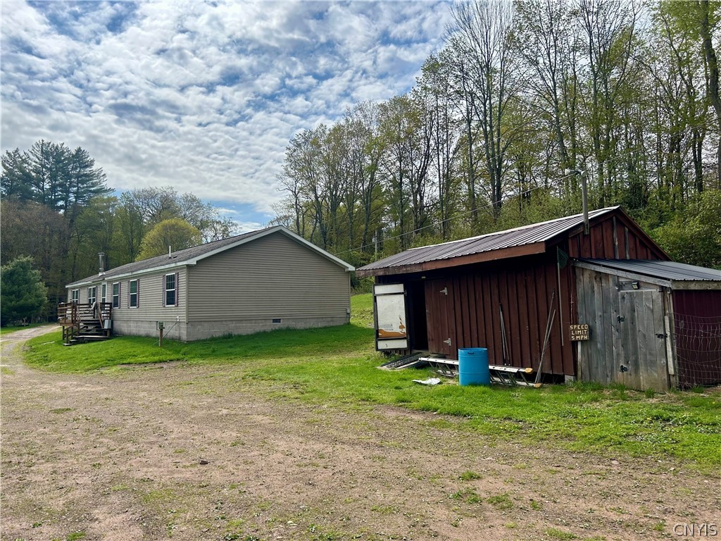 7 Beach Road Amboy, NY 13316 - Photo 6 of 37 Featuring additional sheds for storage