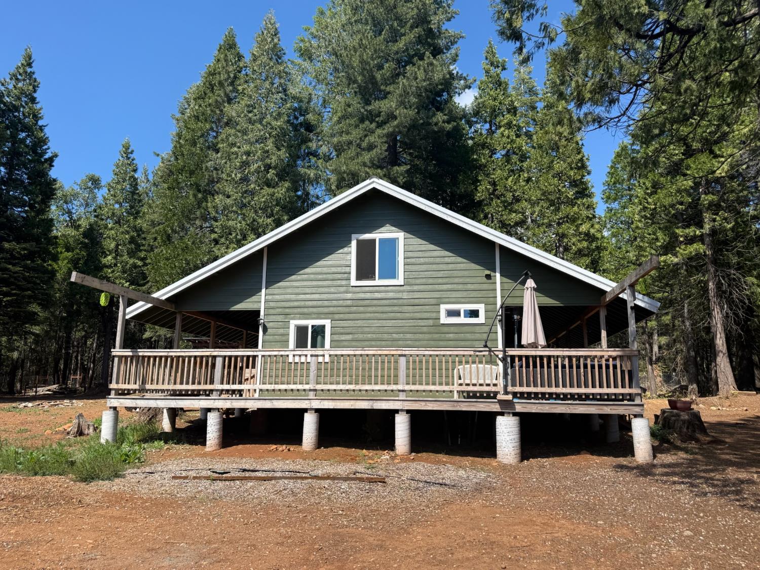 14940 Chalk Bluff Road Nevada City, CA 95959 - Photo 4 of 29 a front view of a house with a balcony