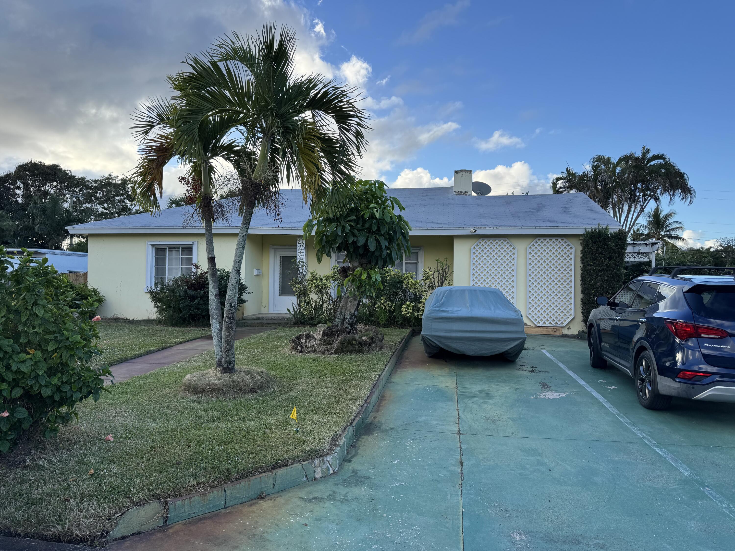 352 Ellamar Road West Palm Beach, FL 33405 - Photo 1 of 1 front