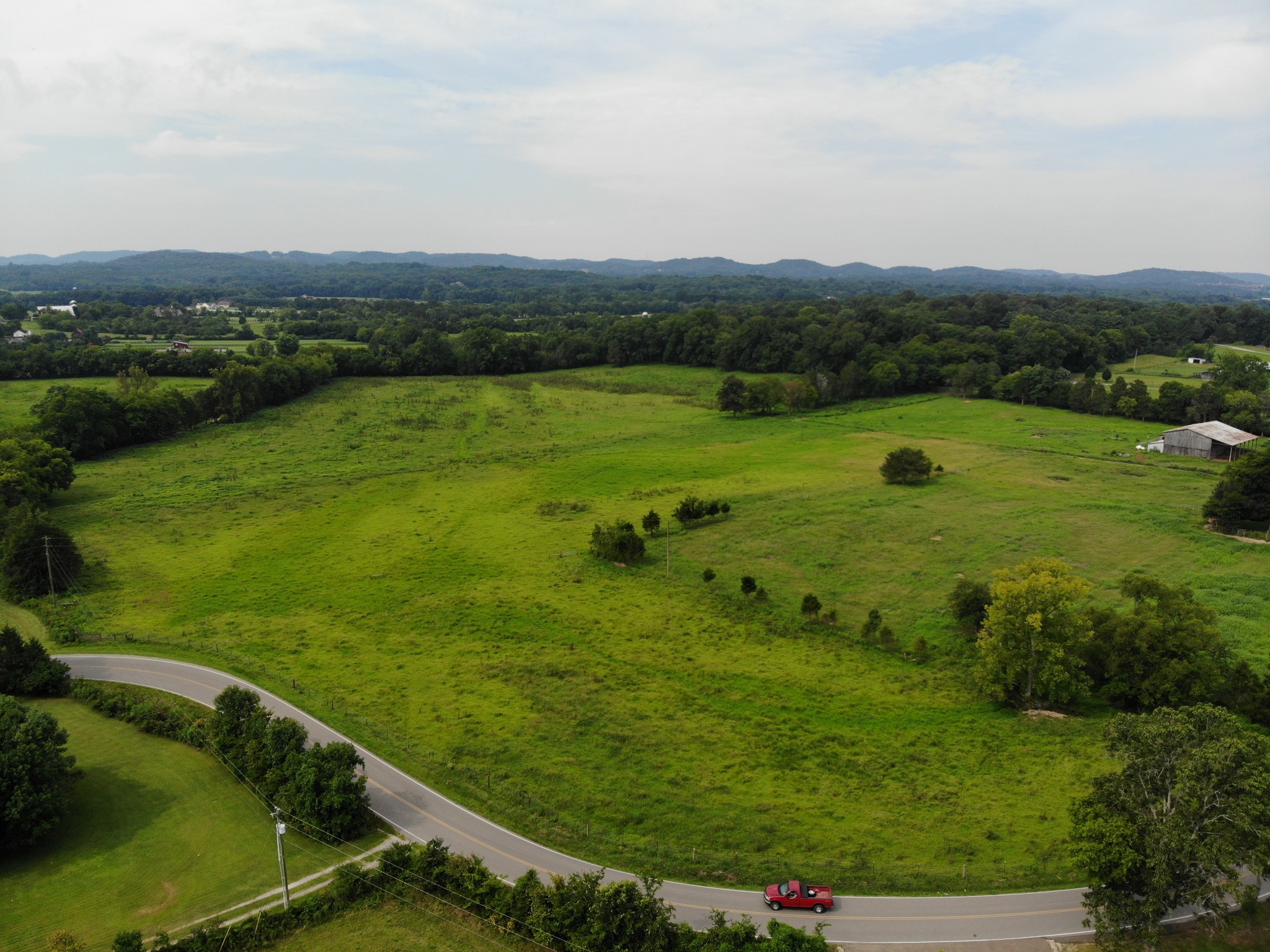 3 North Chapel Road Franklin, TN 37067 - Photo 1 of 19 a view of a lake with a city
