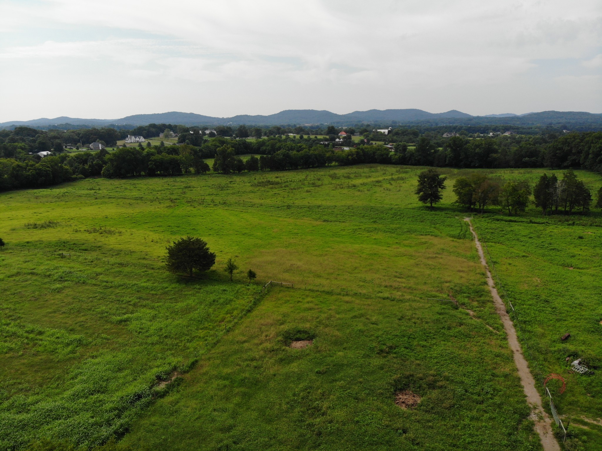 3 North Chapel Road Franklin, TN 37067 - Photo 9 of 19 a view of a lake with a mountain in the background