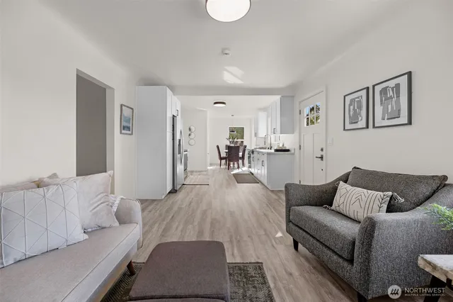 a living room with furniture and a table