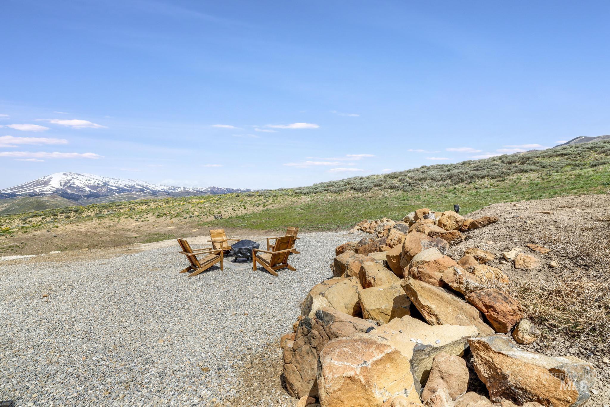 203 North Brush Road Fairfield, ID 83327 - Photo 29 of 50 View of yard featuring a fire pit