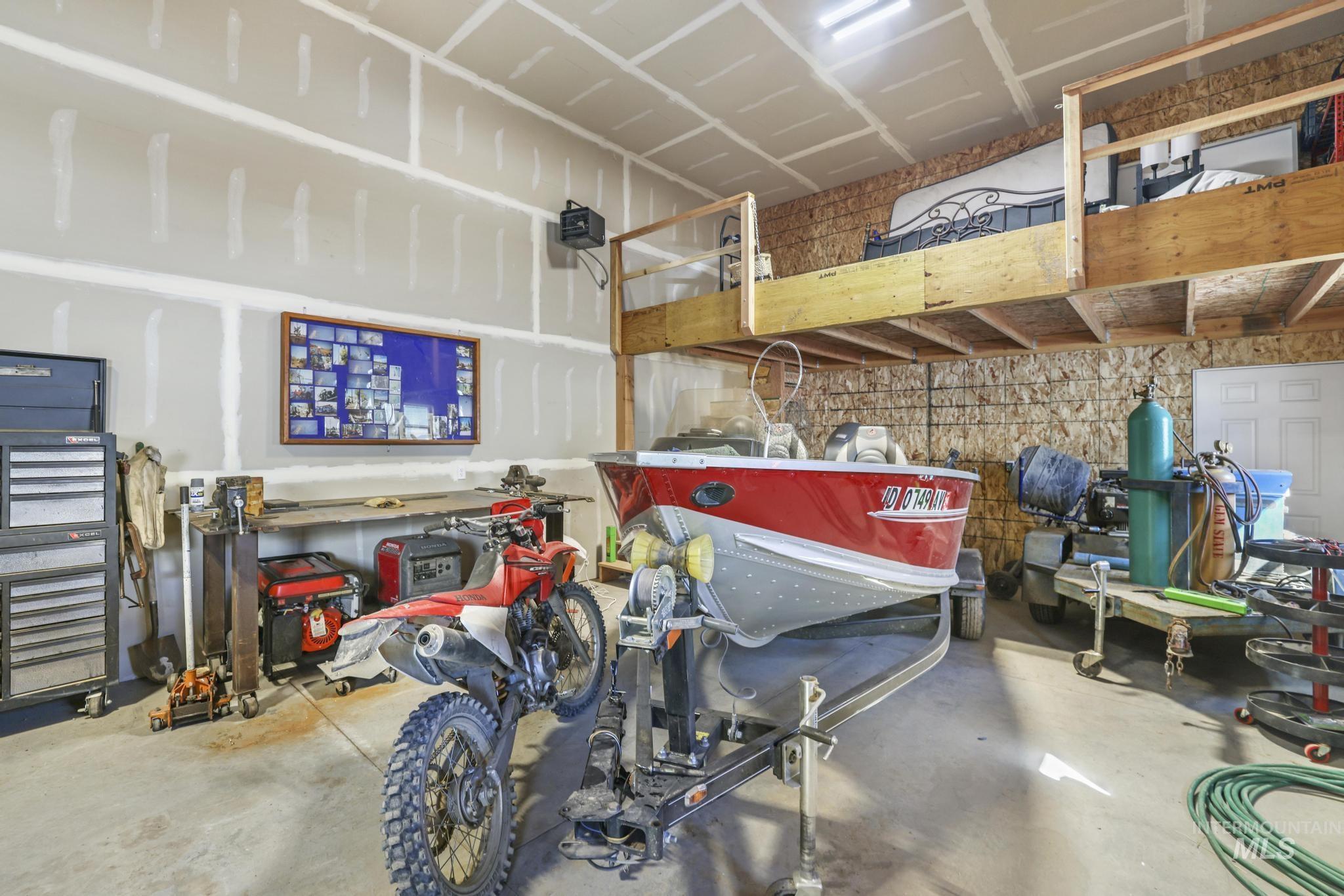 203 North Brush Road Fairfield, ID 83327 - Photo 36 of 50 Garage with a garage door opener