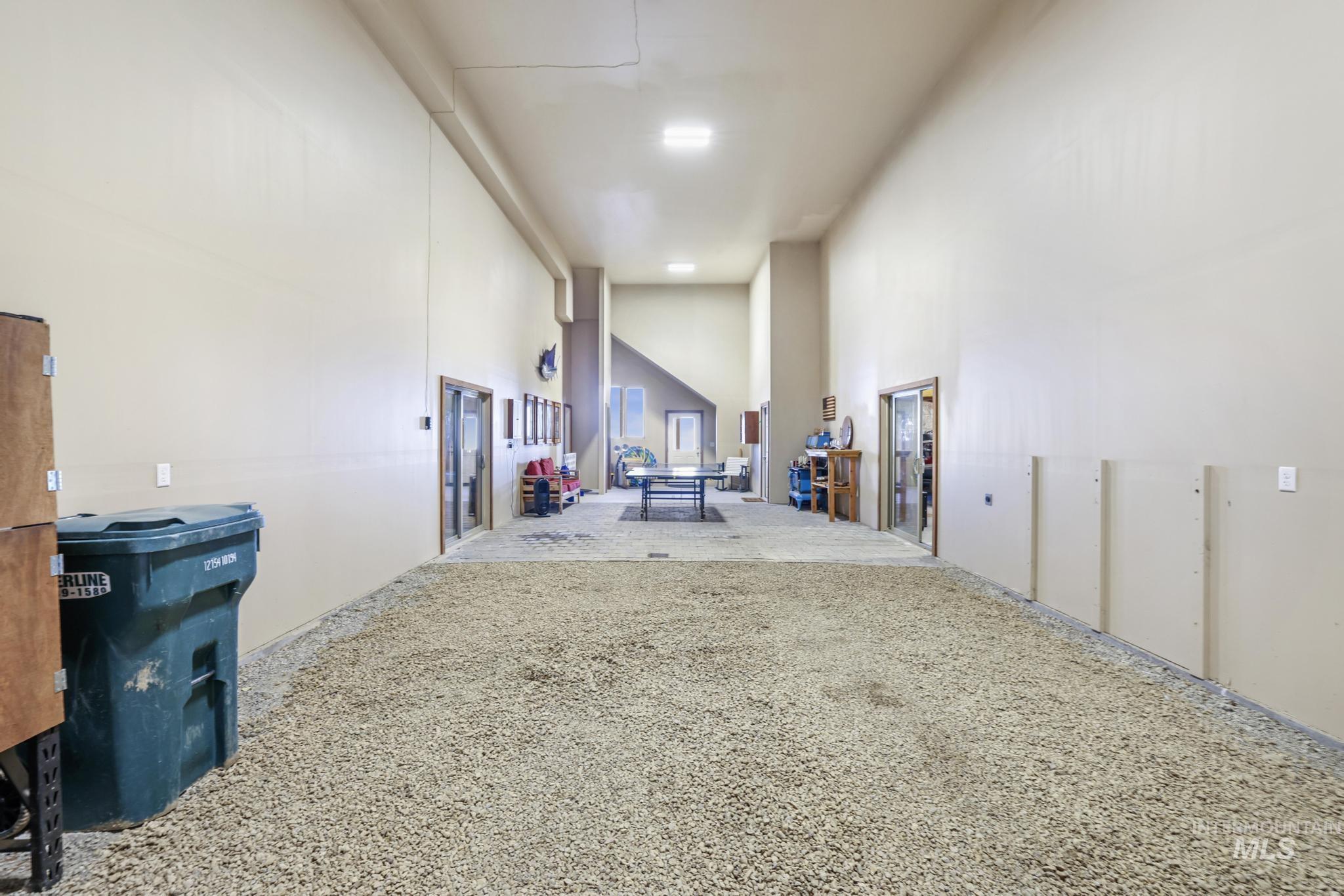 203 North Brush Road Fairfield, ID 83327 - Photo 38 of 50 Miscellaneous room featuring a high ceiling and carpet