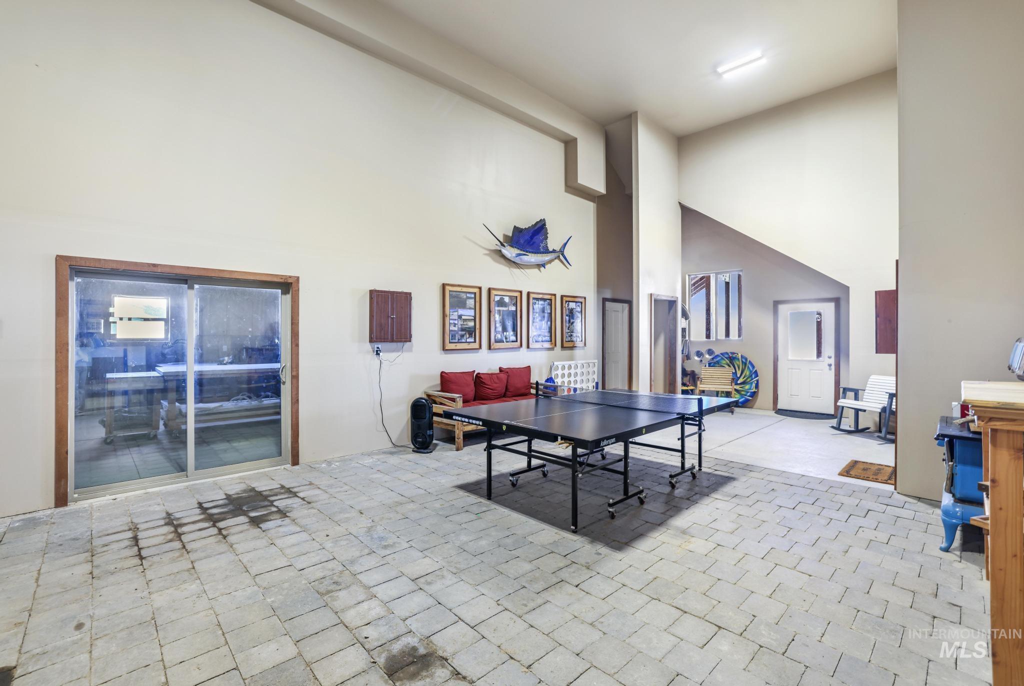 203 North Brush Road Fairfield, ID 83327 - Photo 39 of 50 Playroom with a high ceiling