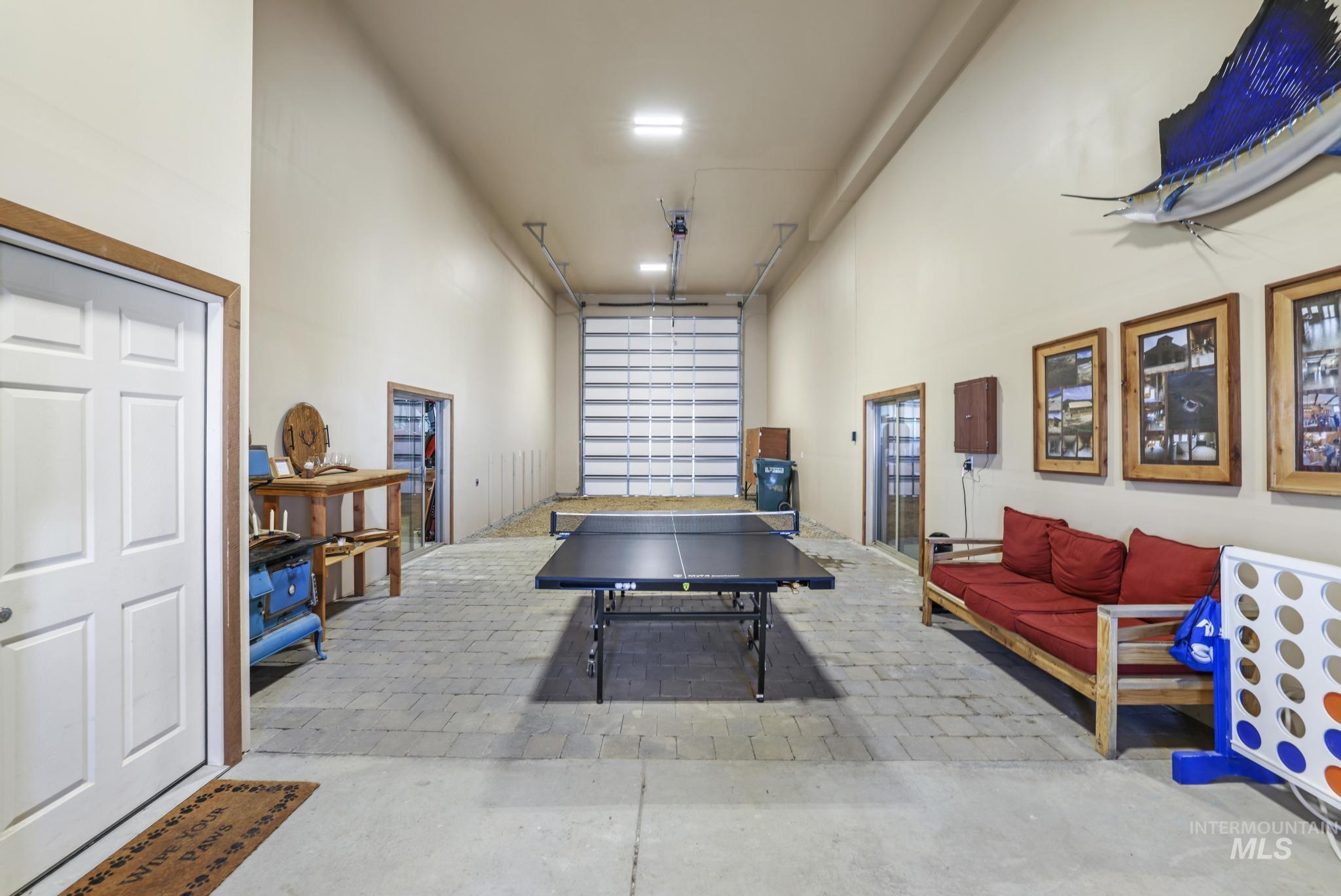 203 North Brush Road Fairfield, ID 83327 - Photo 40 of 50 Game room with a high ceiling
