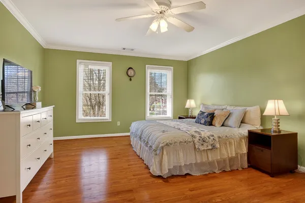 a spacious bathroom with a granite countertop tub and a sink