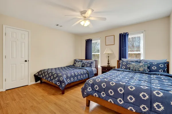 a view of an empty room with closet