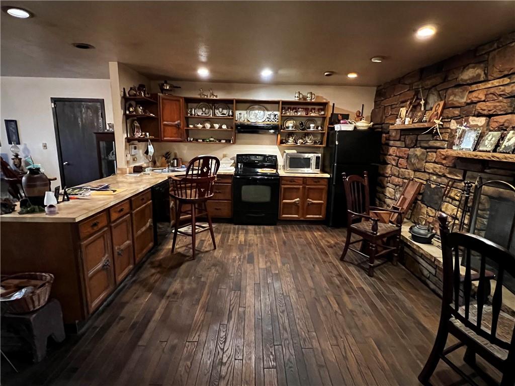 177 Bute Road Uniontown, PA 15401 - Photo 4 of 15 a room with lots of wooden furniture and windows