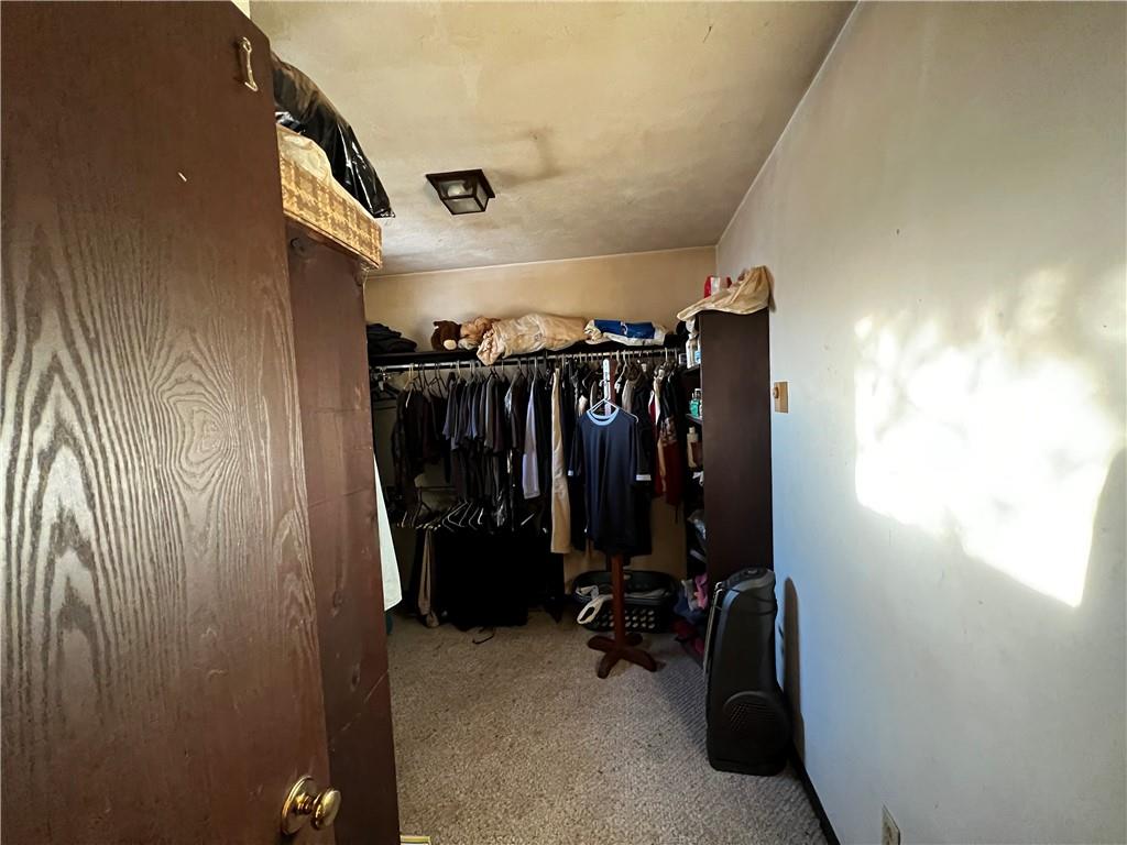 177 Bute Road Uniontown, PA 15401 - Photo 10 of 15 a view of walk in closet with clothes