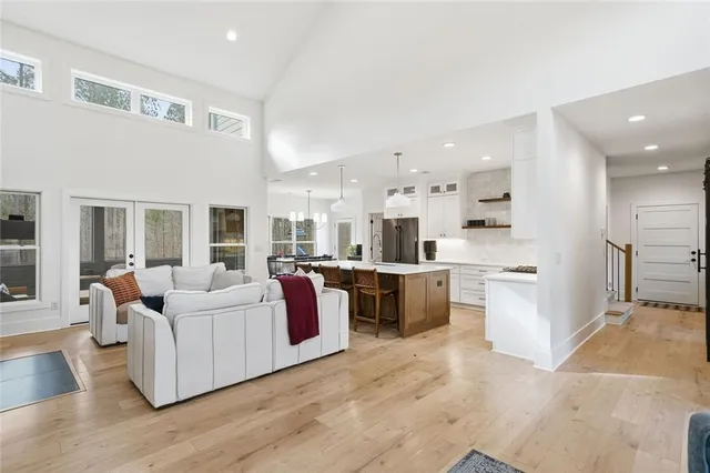 a living room with fireplace a flat screen tv and a fireplace
