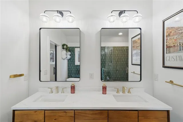 a bathroom with a bathtub and shower