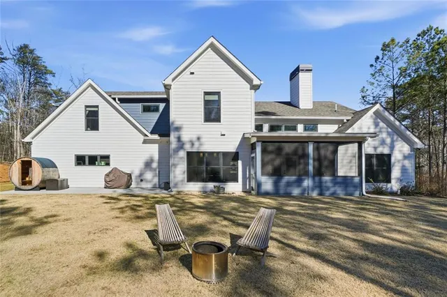 a backyard of a house with lots of green space